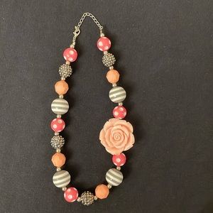 Striped & Poke-a-dot balls with large pink flower. This is so cute.